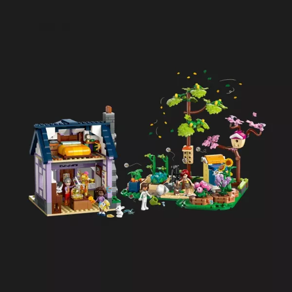 Конструктор LEGO Friends Будиночок і квітник бджолярів (42669)